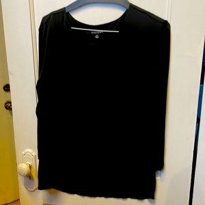 Black medium size top made by Insight.
